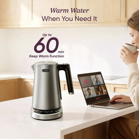 Fast Boiling 1.7L Electric Kettle With Plastic Free Interior And 5 Presets For Tea And Coffee on a kitchen counter with warm function