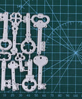 9 Piece Vintage Keys Metal Cutting Dies Set For Scrapbooking And Card Making Dope DIY Die Cuts And Embossing Stencils displayed on a grid mat