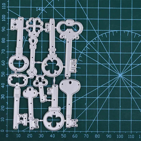 9 Piece Vintage Keys Metal Cutting Dies Set For Scrapbooking And Card Making Dope DIY Die Cuts And Embossing Stencils displayed on a grid mat