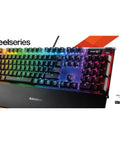 Top Shelf Mechanical Gaming Keyboard Featuring Heavy Duty Aluminum Chassis And Smart Display For Live Game Stats Discord Chats And Spotify Tracks, RGB lighting, compact layout.