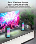 Two 20W Portable Bluetooth Speakers With Crankin Loud Stereo Sound, 8 LED Light Modes in a living room setup
