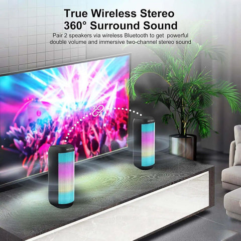 Two 20W Portable Bluetooth Speakers With Crankin Loud Stereo Sound, 8 LED Light Modes in a living room setup