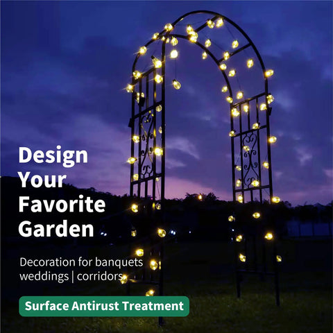 Illuminated sturdy black wrought iron pergola arbor garden arch with ground spikes 100 inches high and 45 inches wide at night