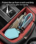 Porsche Macan Center Console Organizer Tray 2 Piece Set Silicone Cup Holder Storage Protective Pad for 2022-2026 with items inside