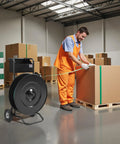 Road Ready Banding Strapping Cart For Pet And Polypropylene Coils Handles Eight Or Sixteen Inch Cores in use at warehouse.