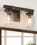Two Light Mason Jar Vanity Light With Faux Wood Finish In Rustic Farmhouse Cozy Vibe Style Moisture Proof Metal Bath Vanity Lighting For Bathroom Or Bedroom Brown mounted above a window.