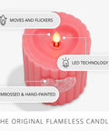 Flickering Flameless Pillar Candle 3.7x4.5 Inches with Real Flame Effect in pink ribbed wax with embossed heart LED light.