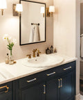 Brass And Clear Acrylic Kitchen Cabinet Pulls 7 Inch installed on black bathroom vanity with gold accents and marble countertop