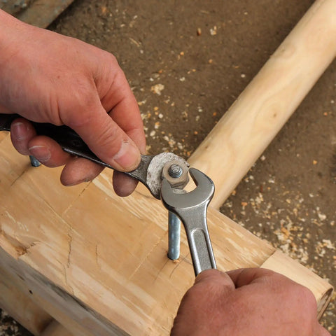 Two Pack 304 Stainless Steel Fully Threaded Rods with Square Washers for Furniture Mounting being tightened with wrench