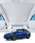 Upgraded magnetic sunshade for Tesla Model Y; two white panels over panoramic roof; blue car