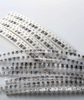 1206 SMD Ceramic Capacitor Assortment Kit, 240 Pieces, showing labeled strips and capacitors for electronics repair