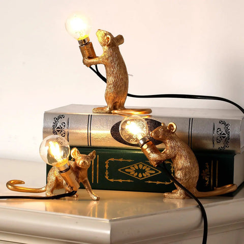 Three Style Resin Mouse Desk Lamp With LED Glow featuring running, sitting, and standing gold mice on books, plug-in light decor.