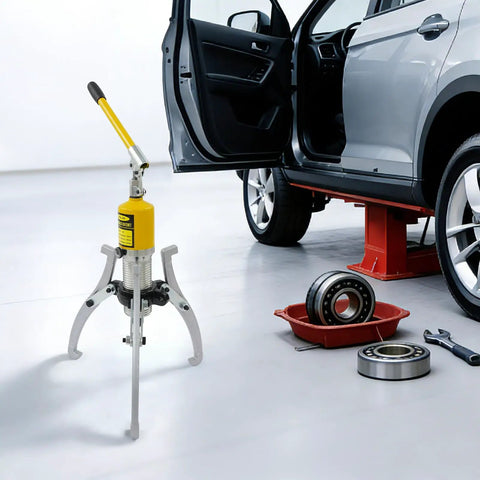 Heavy Duty 20 Ton 3 Jaw Hydraulic Puller Kit For Wheel Bearings Auto Repair Tool Yellow Carry Case Built Like Iron Rust Proof Professional Grade Separator Perfect For Cars Trucks Vans Mechanics Shop Must Haves Durable Gear shown beside car wheel bearing repair
