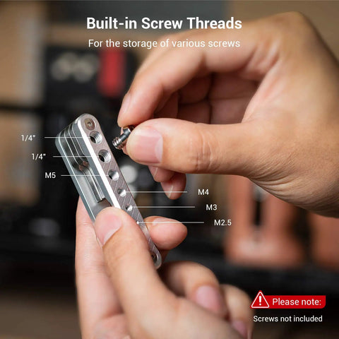 Hands holding a Compact Seven Tool Folding Set With Screwdrivers And Hex Keys For Photographers On The Go, showing built-in screw threads.