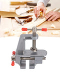 Dope Mini Bench Vise Aluminum Alloy 1.42 Inch Jaw Opening Clamp on workbench with woodworking tools in background