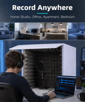 Portable Vocal Booth With Foldable Soundproof Isolation Shield Grab And Go Compact Fold Out Quick Setup Lightweight No Hassle Recording Barrier For Home Studio Creators On A Budget, featuring a user recording in an office setting.