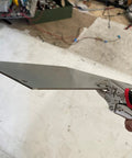 7.5 Inch Heavy Duty Locking Pliers with Screw Extractor and Curved Jaws holding a metal sheet in workshop setting