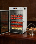 Heavy Duty Electric Food Dehydrator With 18 Spacious Stainless Steel Trays And Precision Adjustable Thermostat displayed with strawberries and tomatoes.