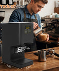 Electronic Automatic Espresso Tamper With 58mm Coffee Distribution Disc Adjustable Pressure Settings Electric Barista Sidekick For Home Shops Kicks Hand Fatigue Out The Door Straight Up Dope in a kitchen setting.