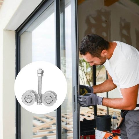 Heavy Duty Sliding Door Roller With Steel Track Pulley Built Tough For Heavy Loads Industrial Grade Gate Trolley 200kg Load Capacity Durable Steel Wheel Replacement For Doors And Gates Silver Model 3 installed on a glass sliding door being adjusted by a man.