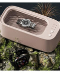 Buff That Bling Out Smooth With This Timed Ultrasonic Cleaner Delivering High Frequency Vibration For Legit Deep Cleaning Of Rings Watches Eyewear Tools Compact Clean As A Whistle Setup with watch submerged in cleaning solution