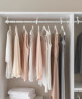 Heavy Duty Closet Rod Center Supports Four Piece Rock Solid Premium Wall Mount Steel Brackets Zero Sag Guarantee Beefy Build Top Shelf Wardrobe Storage Hardware White with hanging clothes.