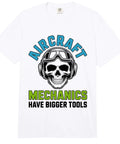 White tee with "Aircraft Mechanics Have Bigger Tools" text, skull graphic, aviation humor. Aviation Mechanic Gear Tee For The Aviation Maintenance Crew Keeping Planes Safe And Flight Ready With Bigger Tools Engine Repair Pride Aircraft Maintenance Humor And Pride In Engineering.