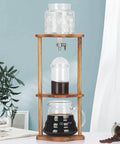 Top Shelf Cold Brew Coffee Maker With Clear Glass Carafe And Sturdy Wood Base Stainless Steel Drip Valve on kitchen counter