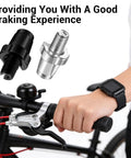 Cyclist using 7mm Bike Brake Cable Lever Adjuster Screws Set for Mountain Bikes; black and silver aluminum bolts shown