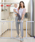 Woman holding child near Heavy Duty Pet Safety Gate For Doors And Stairs 29.5 To 51.5 Inch Wide Auto Close Extra Tall And Wide Walk Through Gate