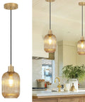 Two Pack Top Tier Amber Cylinder Pendant Lights With Vintage Ribbed Hand Blown Glass And Brushed Gold Adjustable Fixtures in kitchen