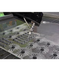 Rock Solid 5 Axis Cnc Water Jet Cutter Built Like A Tank Delivering Laser Precision cutting intricate patterns in metal sheet.