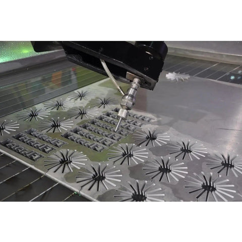 Rock Solid 5 Axis Cnc Water Jet Cutter Built Like A Tank Delivering Laser Precision cutting intricate patterns in metal sheet.