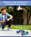 Boy playing with Sensing RC Stunt Car For Kids With 2.4GHz Hand Remote outdoors on pavement