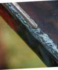 Close-up of Aluminum Welding Rods Set With Low Temp Easy To Use Weld Sticks For Beginners And Pros on a metal joint