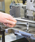 Using Pivot Head Hex Pro Wrench Set 3 4 5 6 8 10mm Six Piece Chrome Wrenches With Pouch on a metal machine component