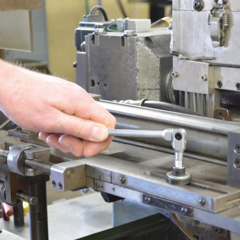 Using Pivot Head Hex Pro Wrench Set 3 4 5 6 8 10mm Six Piece Chrome Wrenches With Pouch on a metal machine component