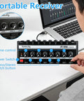Person adjusting HA800S Eight Channel Stereo Line Mixer For Sub Mixing With Independent Volume Control And Stereo Mono Toggle