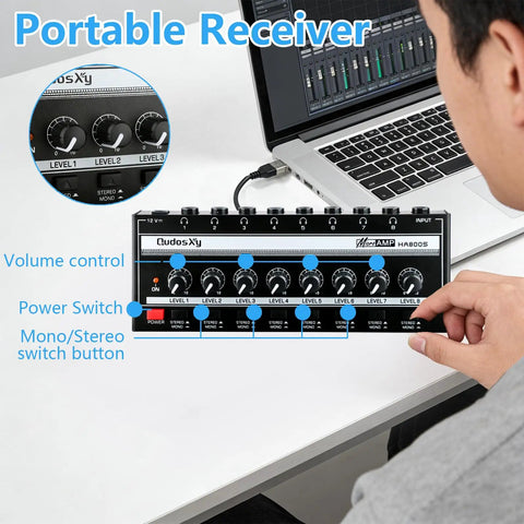 Person adjusting HA800S Eight Channel Stereo Line Mixer For Sub Mixing With Independent Volume Control And Stereo Mono Toggle