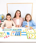Children and teacher using 84 Piece Magnetic Number Bonds and Magnetic Ten Frames Set for classroom math activities on whiteboard