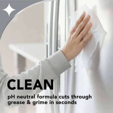 Hand using wipes from Stainless Steel Cleaner And Polish Kit Three Piece With Spray Wipes And Cloth Anti Fingerprint Formula.
