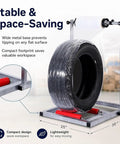 Hella Adjustable Tire Wrap Dispenser Stand For Car And Truck Wheels With Dual Roller Base, holding a tire wrapped in film.