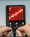 Hands adjusting potentiometers on LED Chaser Soldering Practice Kit With 81 LEDs On A Handy PCB Board For STEM Electronics Projects