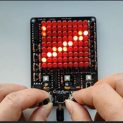 Hands adjusting potentiometers on LED Chaser Soldering Practice Kit With 81 LEDs On A Handy PCB Board For STEM Electronics Projects