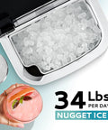 EUHOMY nugget ice maker countertop in black; ice-filled bin with a pink cocktail nearby