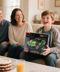 Smiling boy holding 2 In 1 Remote Control Race Car And Robot Building Kit With 429 Pieces, App Control And RC Fun, STEM Toy box