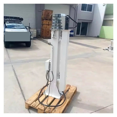 Heavy Duty Quick Deploy Electric Hydraulic Telescopic Mast Pole With Slick Push Button Operation And Rock Solid Auto Lock For LED floodlights, displayed on wooden pallet.