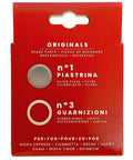 Front view: red blister-pack of moka express replacement parts with gray filter plate and gasket