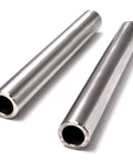 Two stainless steel axle sleeves from the Stainless Steel Front Wheel Bearing Axle Sleeve Upgrade Kit Fits Scag 43583 Exmark Toro Groundsmaster.