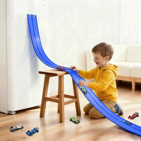 Child playing with 15 Ft Flexible Race Track Set With Two Lane Track And 6 Toy Cars For Kids, easy to set up and portable PVC track.